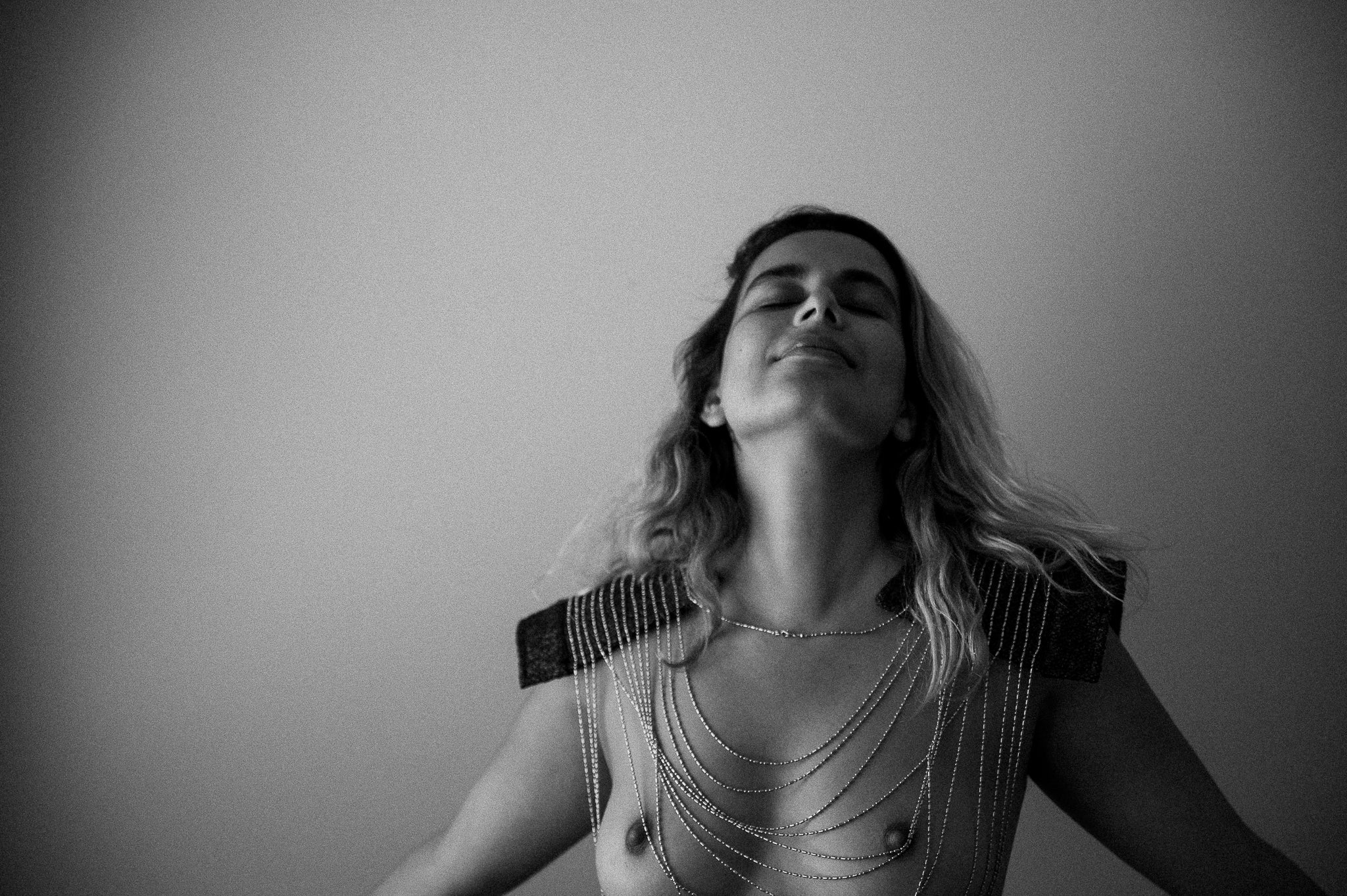 topless woman taking deep breath