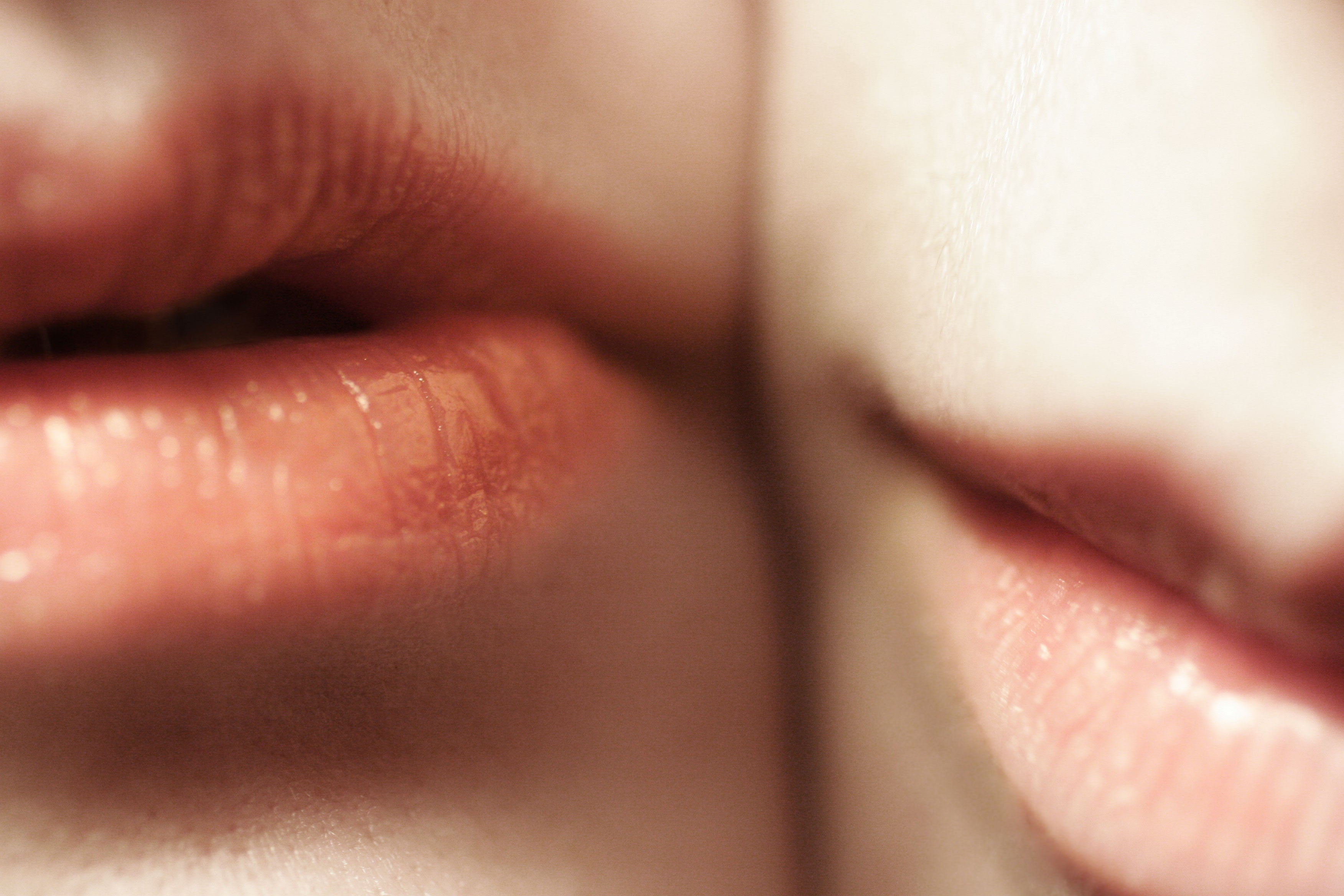 two women's lips close together